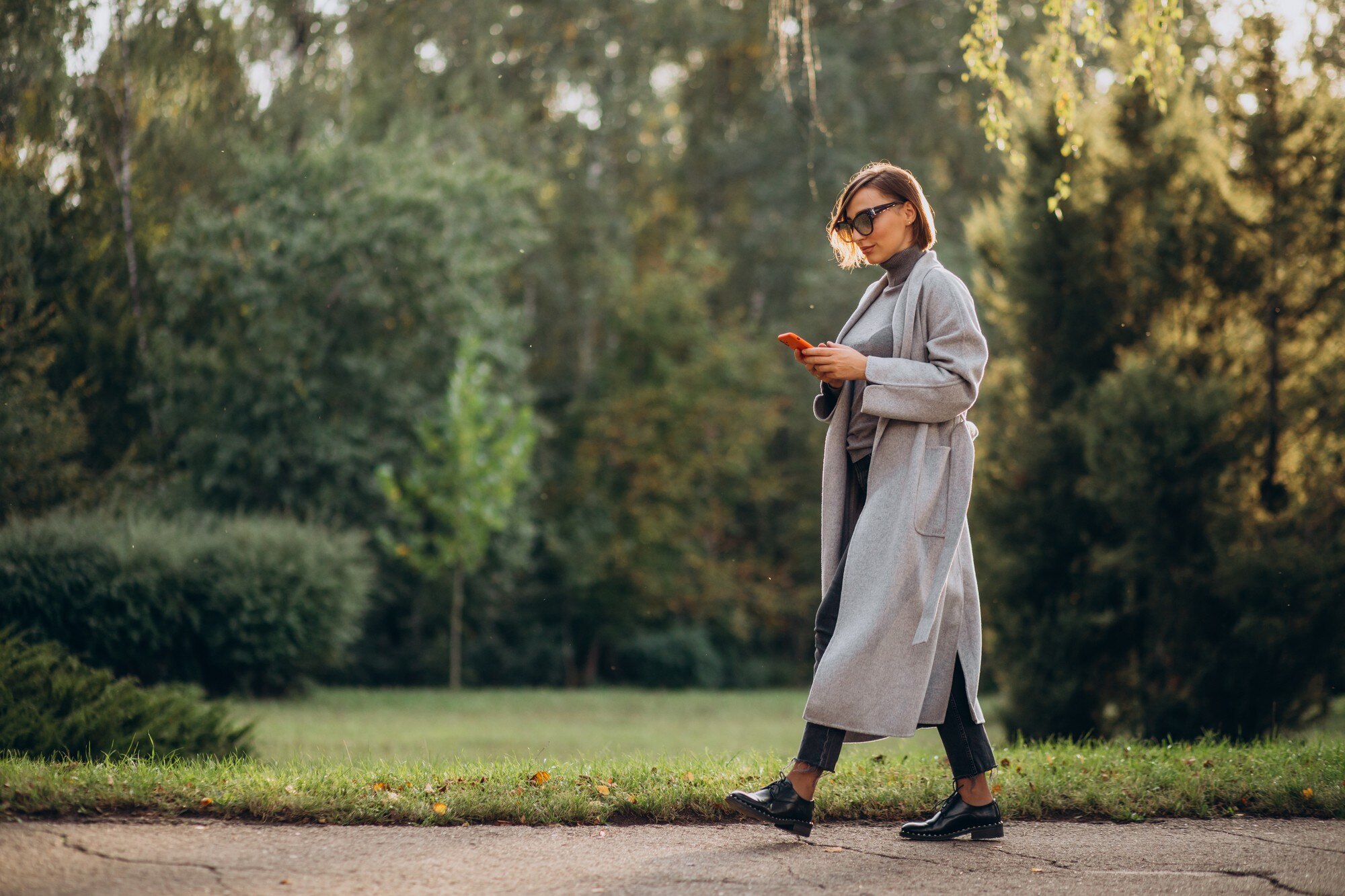 Person walking through a calm park path